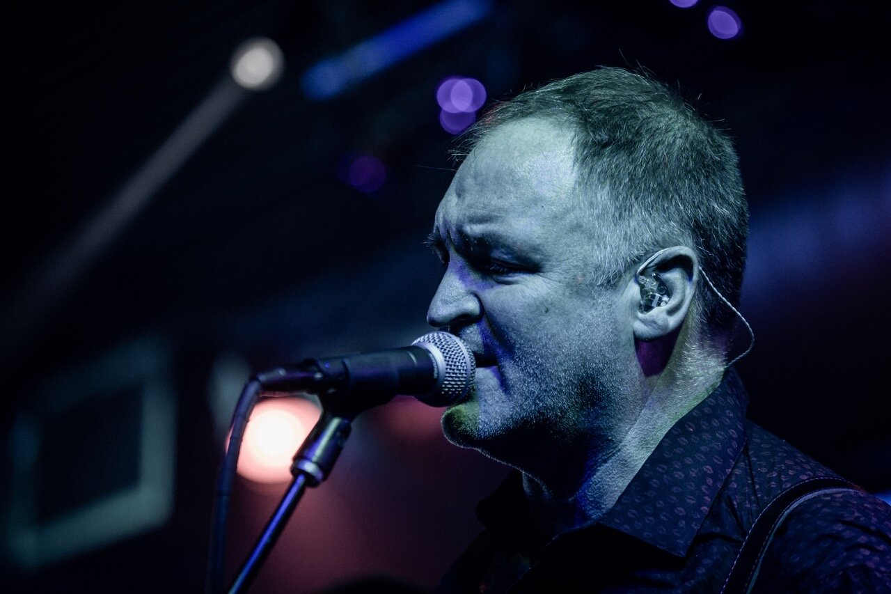 Kevin Grossnicklaus close-up singing backup vocals at Sky Music Lounge